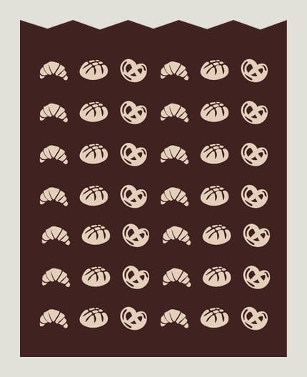 Dark brown paper bag covered in a cream pattern of croissants, pretzels and bread rolls