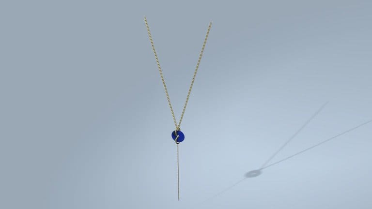 3D render: a fine gold necklace with a small blue drop
